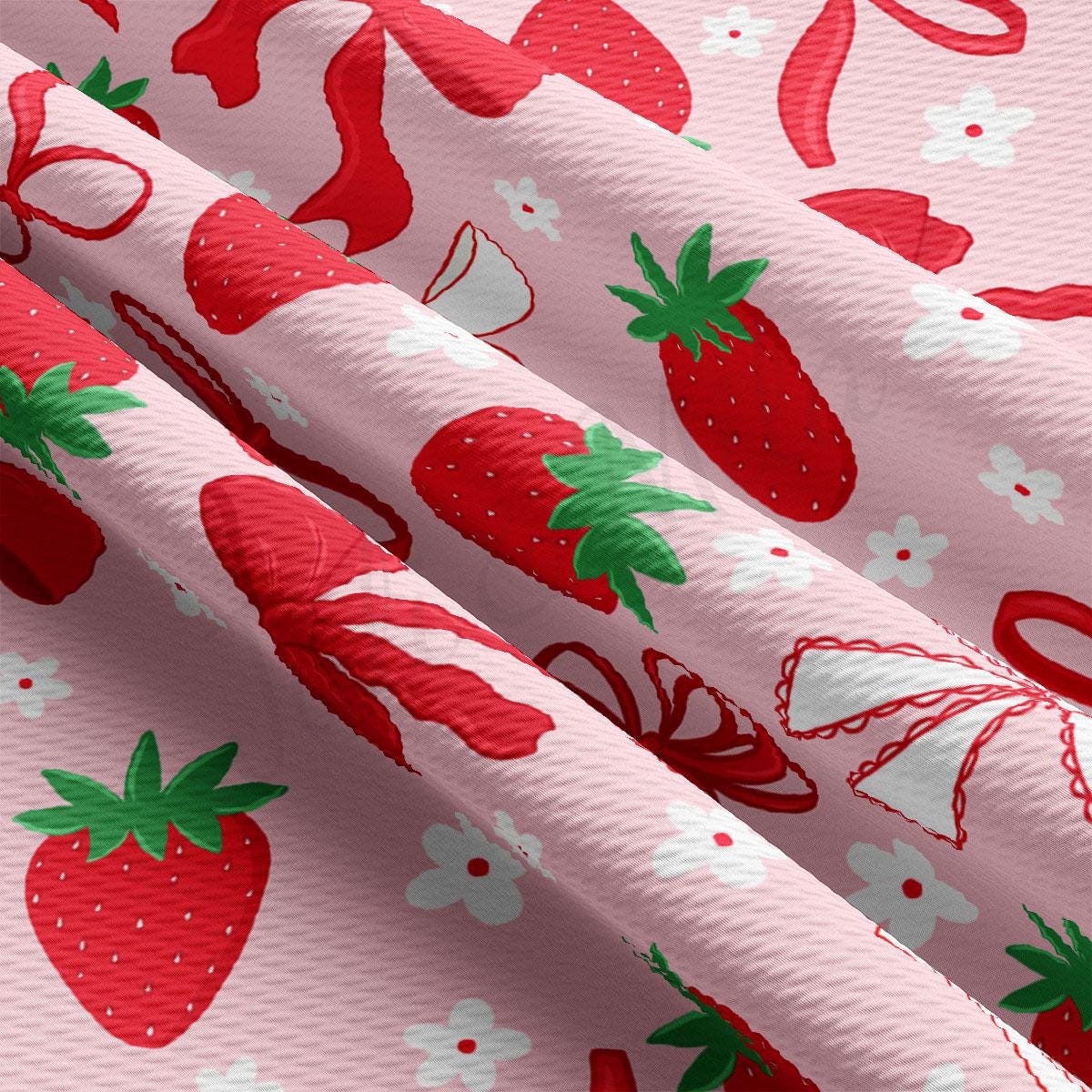 a close up of a pink background with strawberries