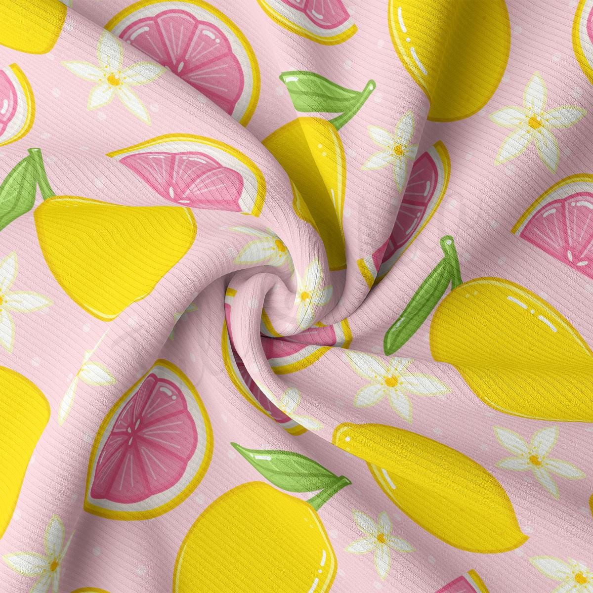 a pink and yellow fabric with lemons on it