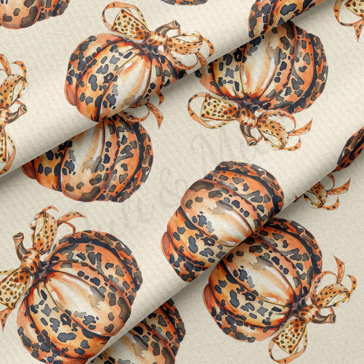 a repeating pattern of leopard print pumpkins with bows on a beige background.
