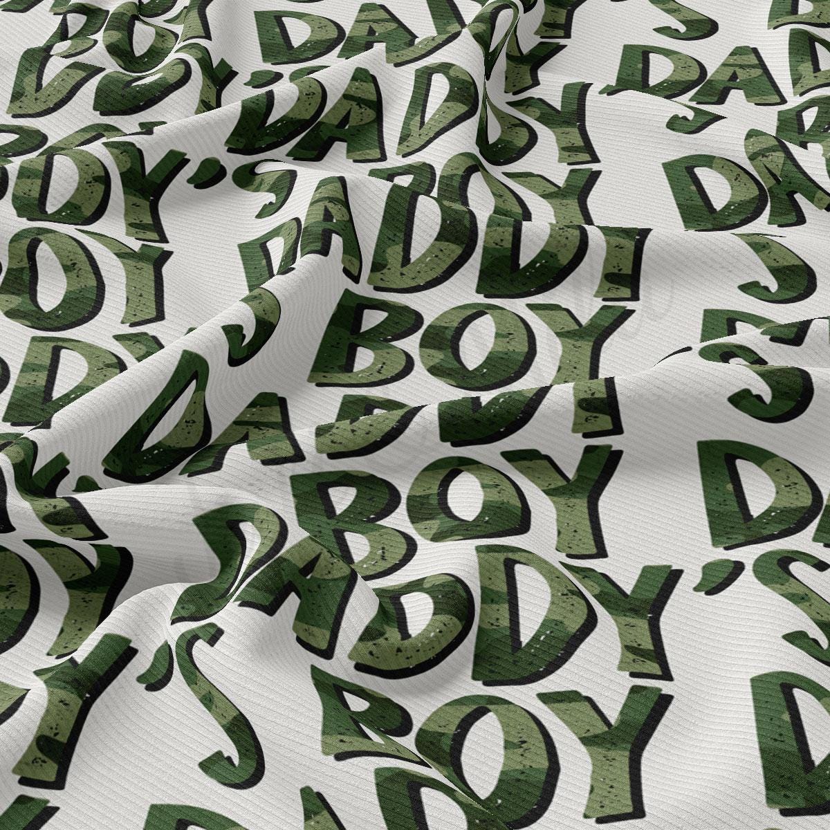 a green and white fabric with letters and numbers on it