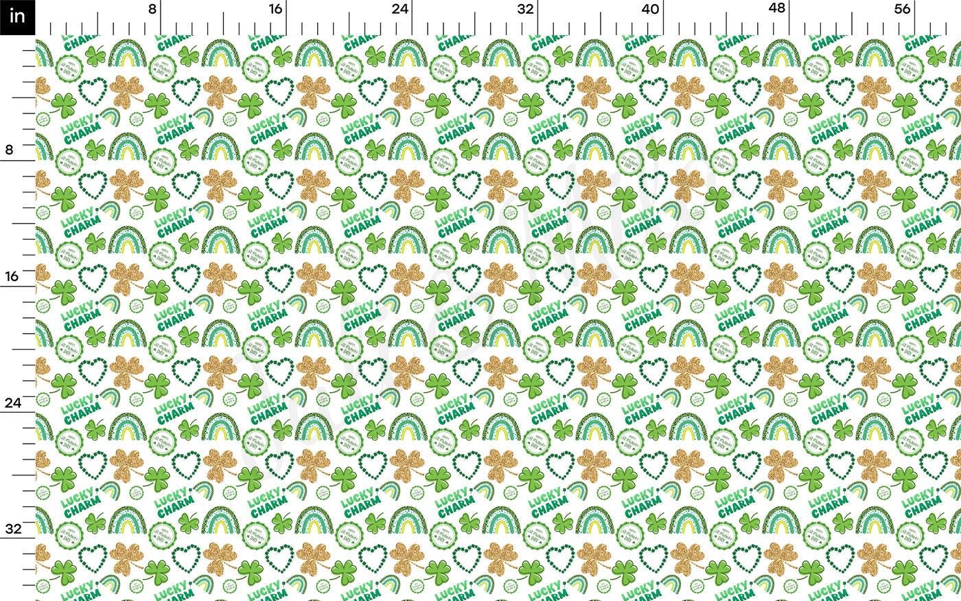 a green and white pattern with shamrocks and hearts