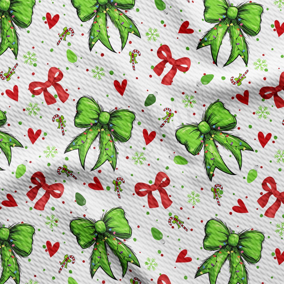 a repeating pattern of green bows, red bows, hearts, and snowflakes on a white background.