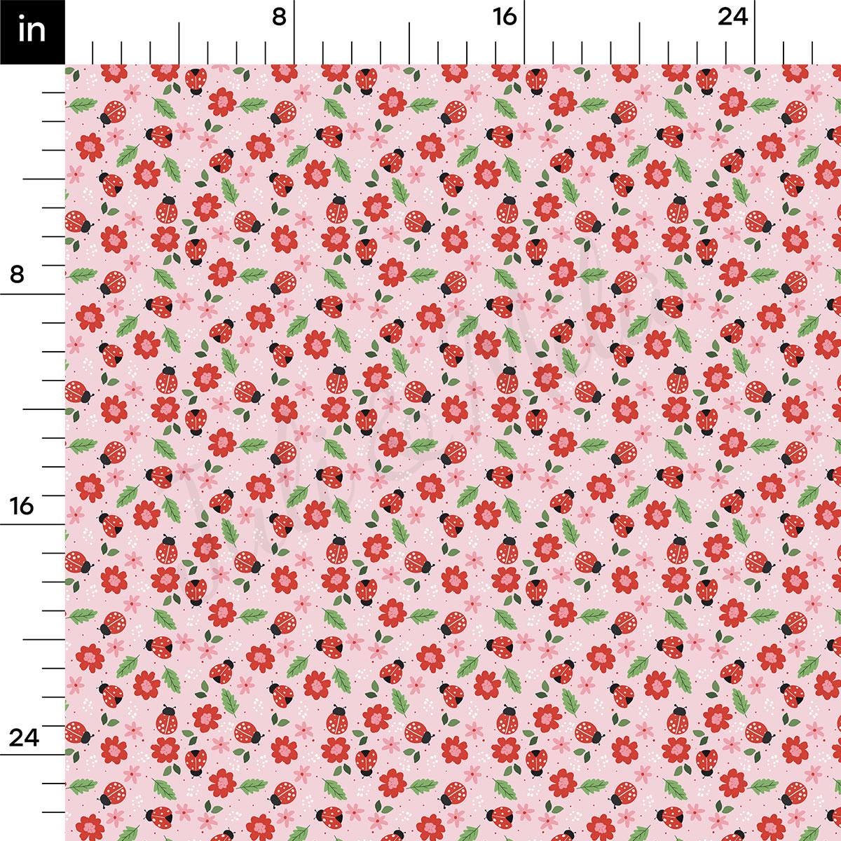 a pink background with red flowers and green leaves
