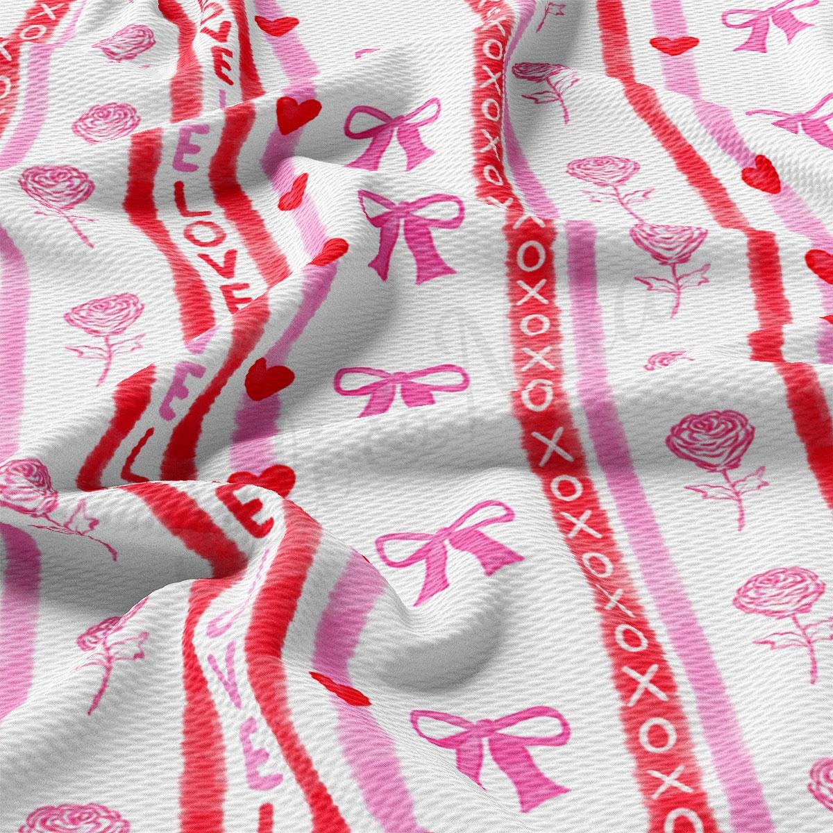 a close up of a pink and white fabric