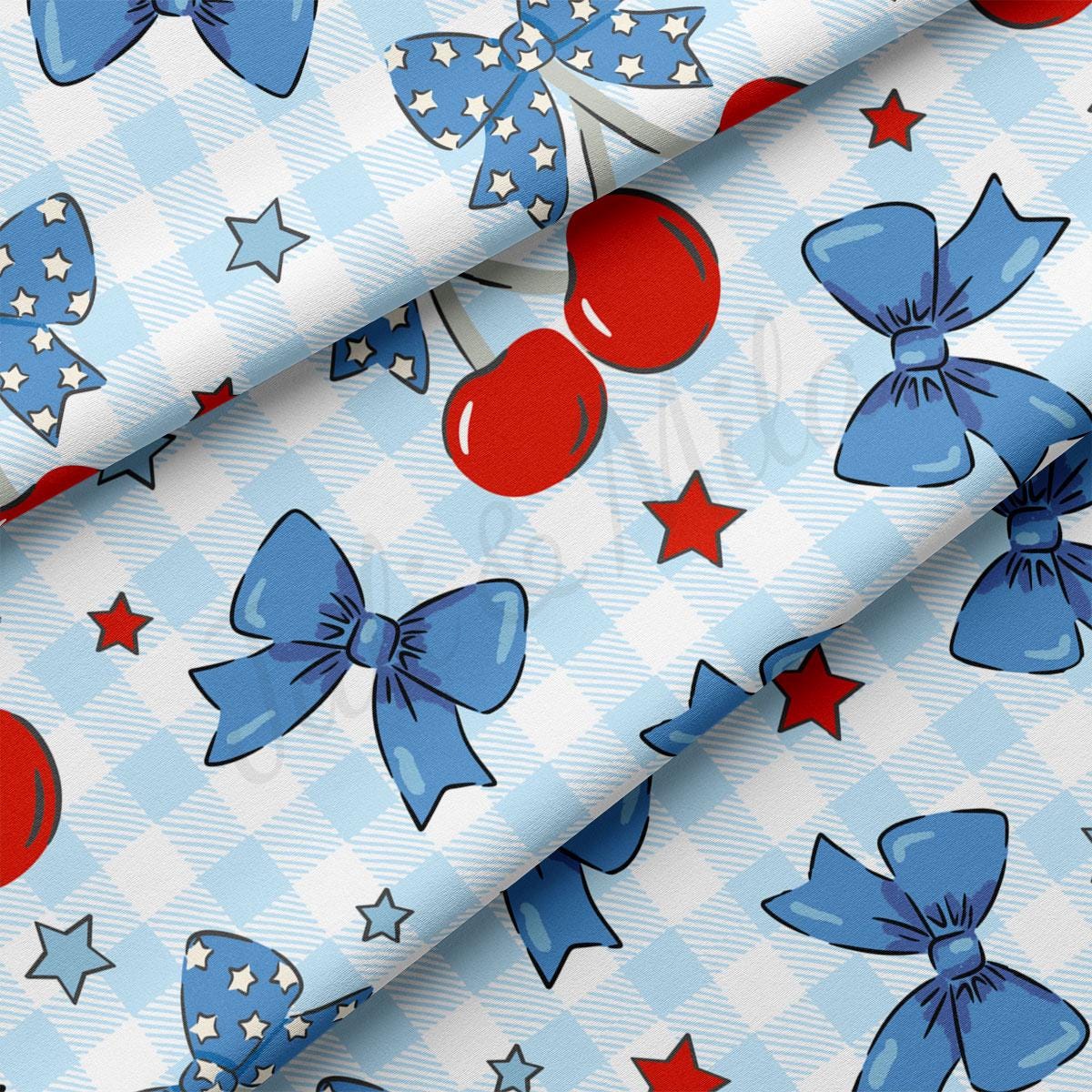 a blue and white checkered fabric with red, white, and blue bows