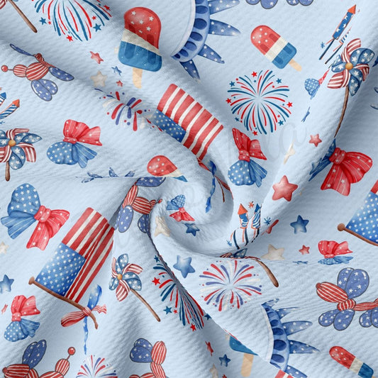 a white fabric with red, white, and blue designs