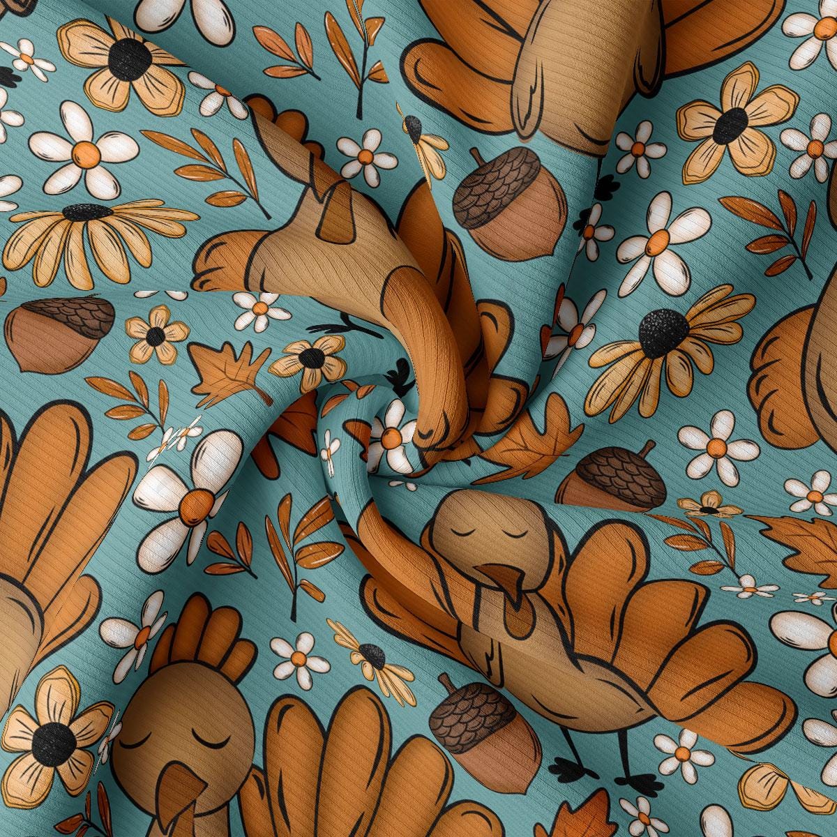 The image is a close-up of a fabric with a repeating pattern of autumn-themed elements, including flowers, leaves, acorns, and turkeys.