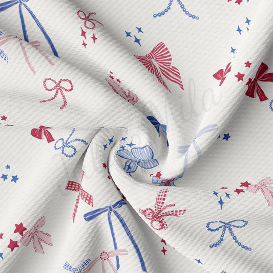 a white fabric with red, white and blue designs