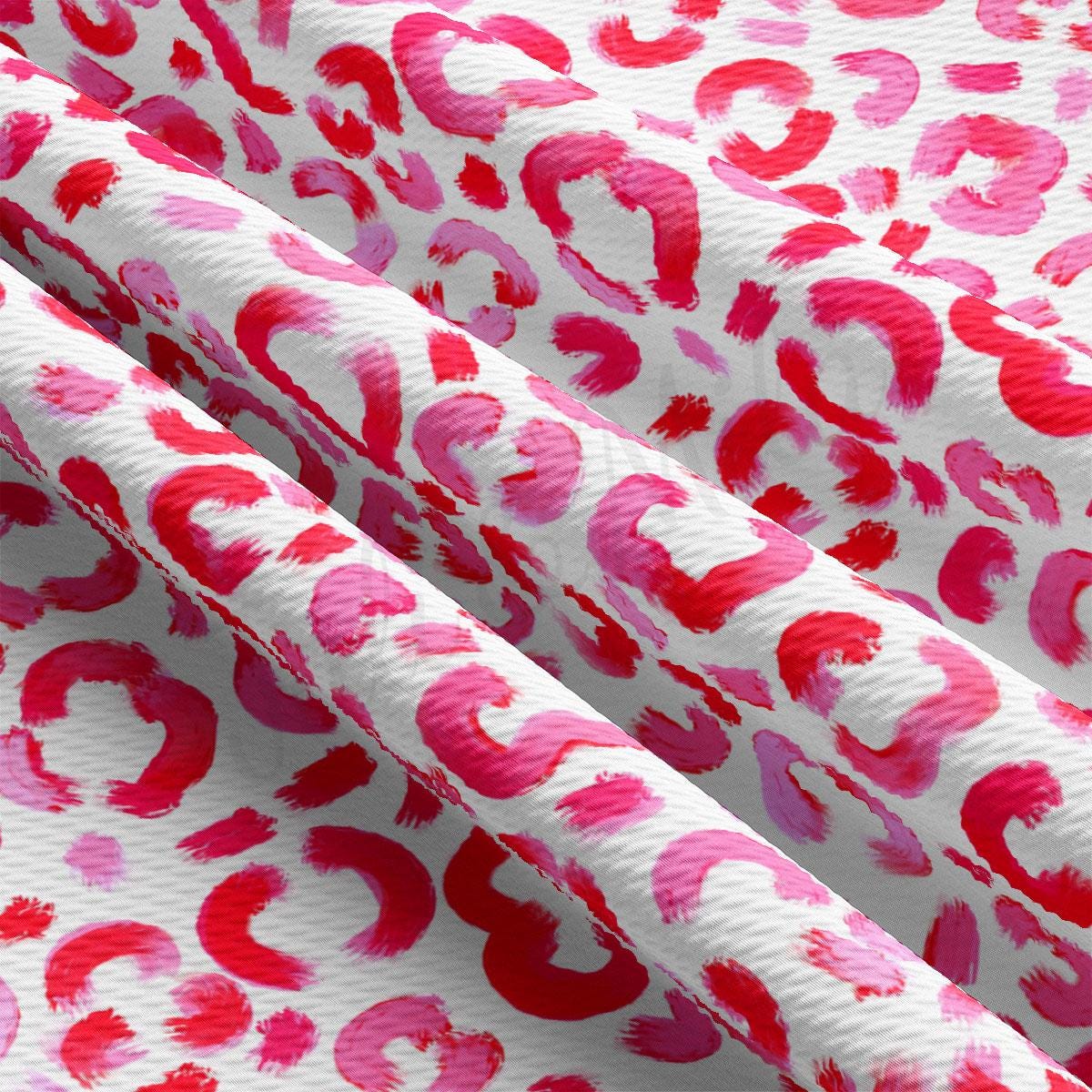 a pink and red pattern on a white background