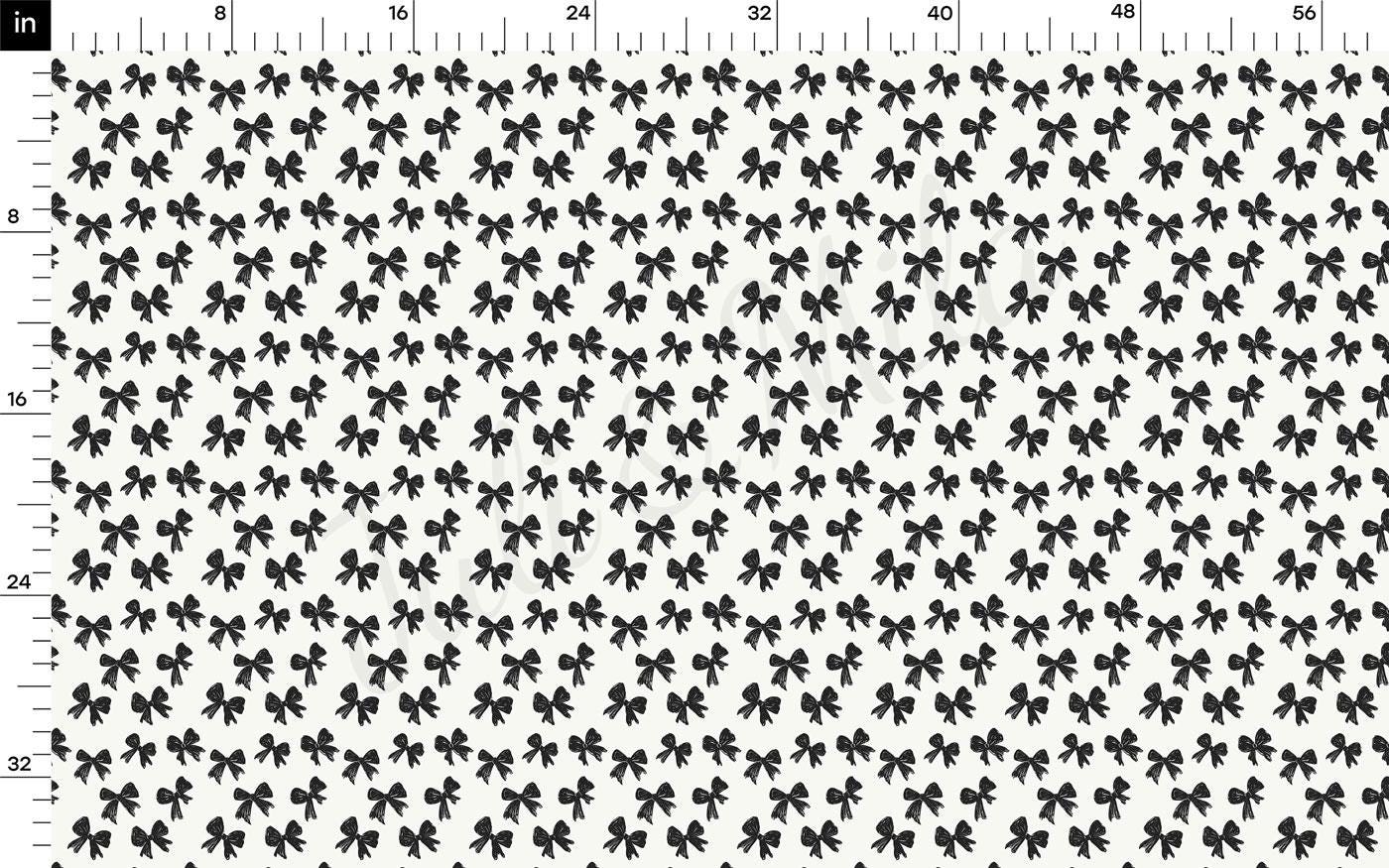 a repeating pattern of black and white bows on a white background.