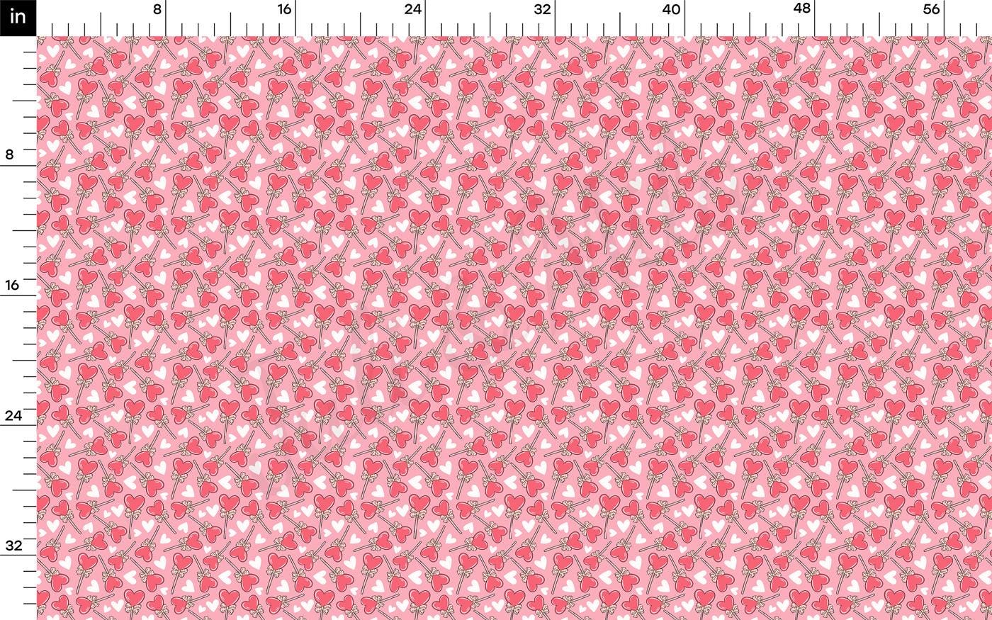 a ruler with a pink pattern on it