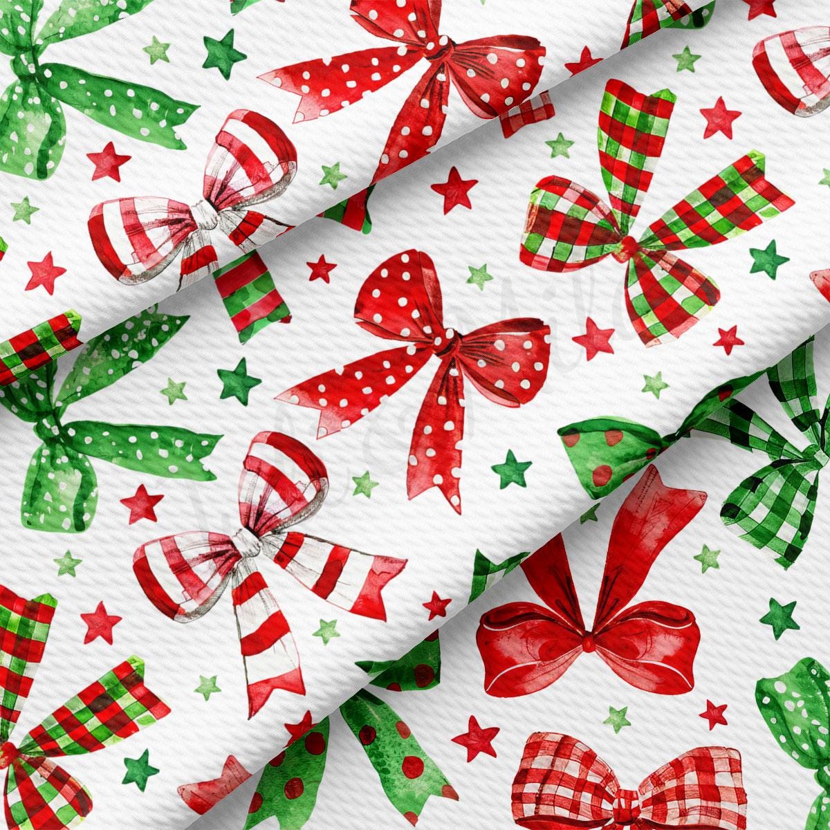 a festive pattern of red and green bows, stars, and polka dots on a white background.