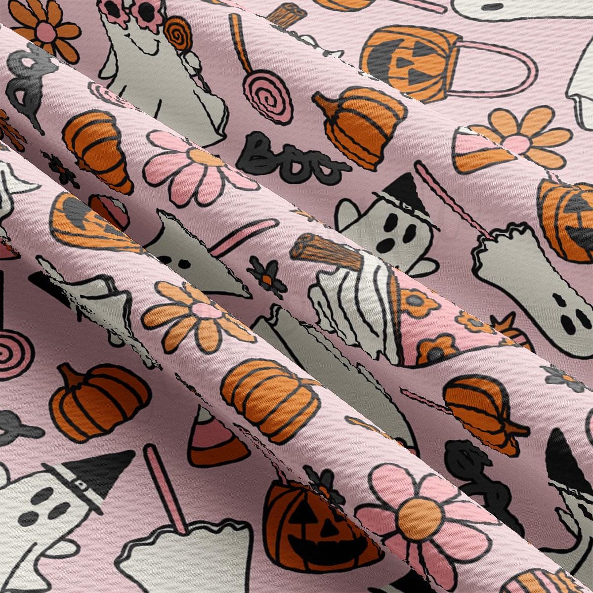 a close up of a pattern on a pink background