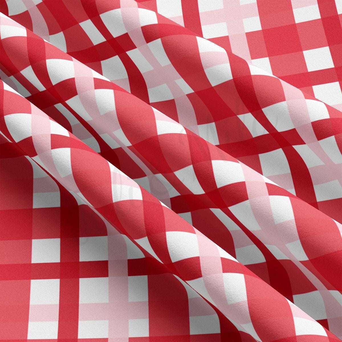 a red and white checkered fabric with white squares