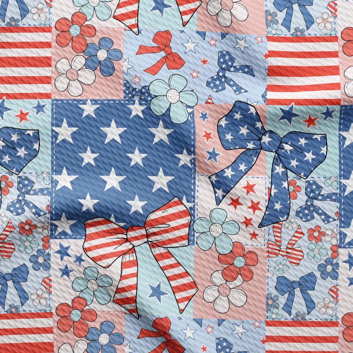 a red, white, and blue pattern with bows
