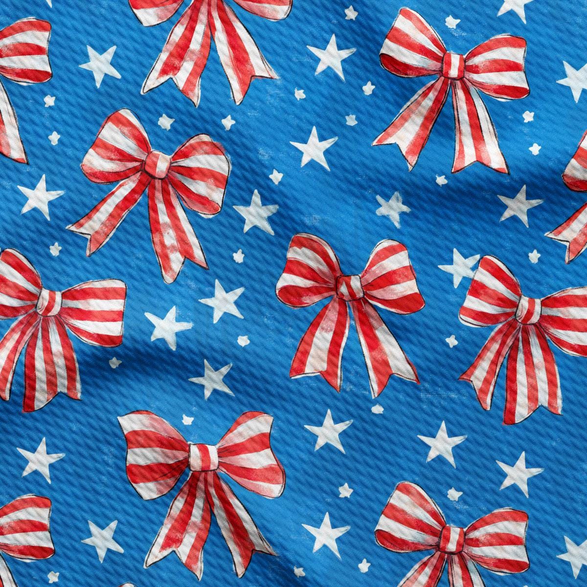 a blue background with red and white bows