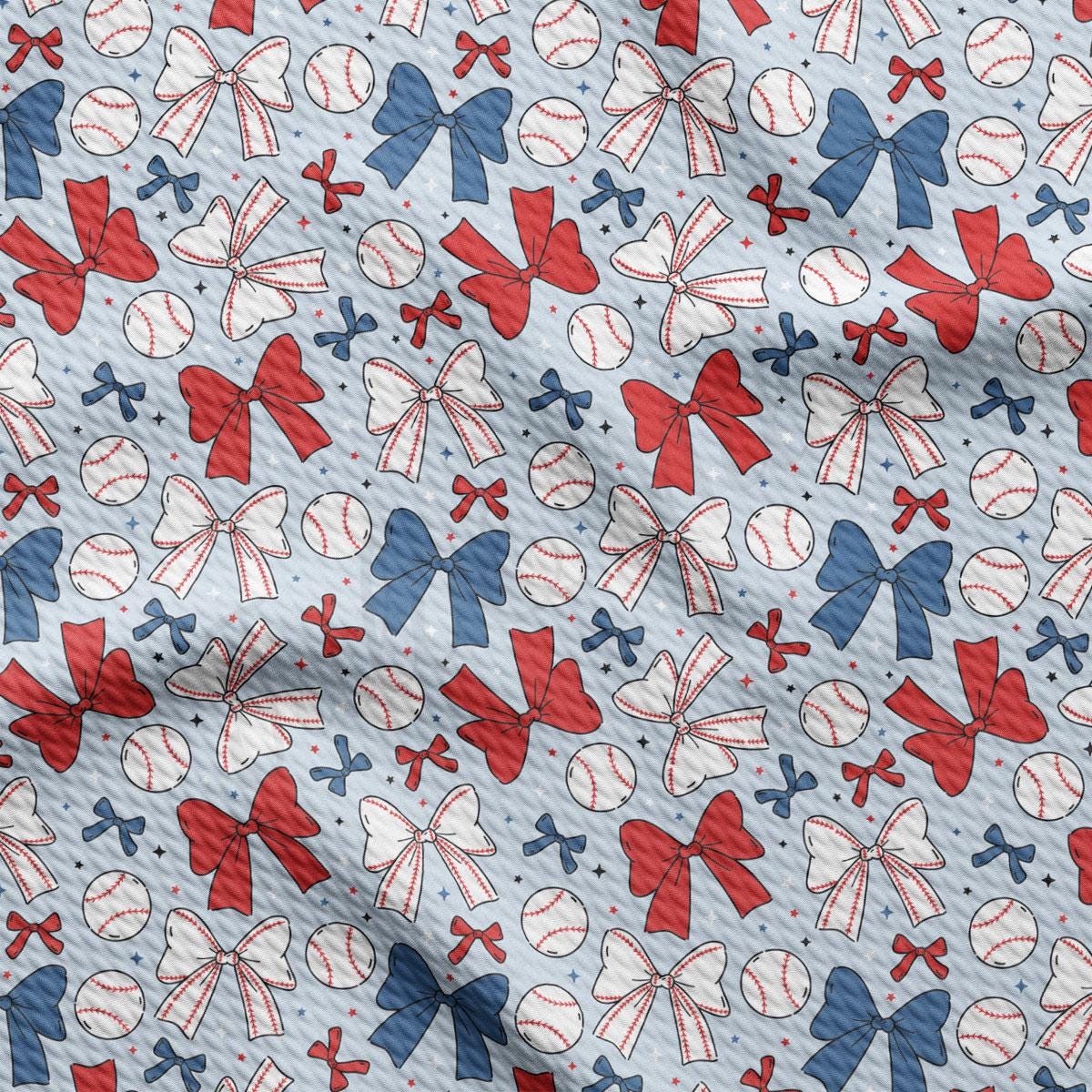 a red, white, and blue pattern of baseballs and bows