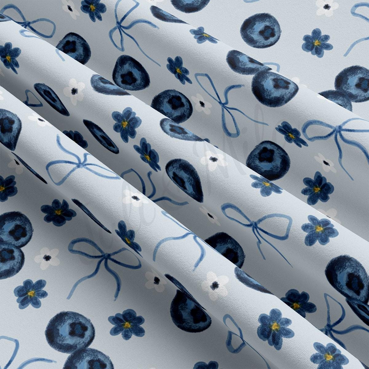 a close up of a pattern of blue flowers