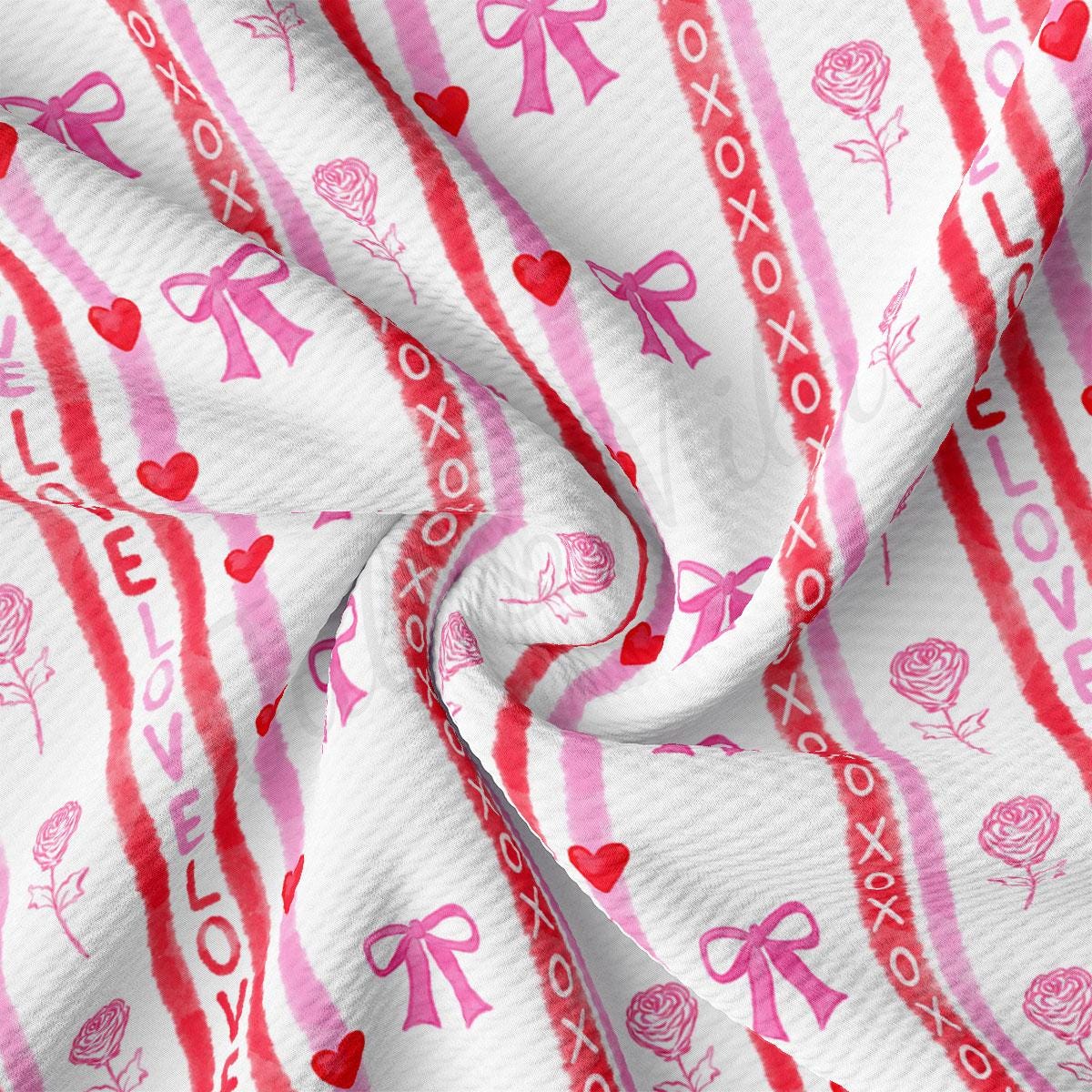 a close up of a pink and red striped fabric