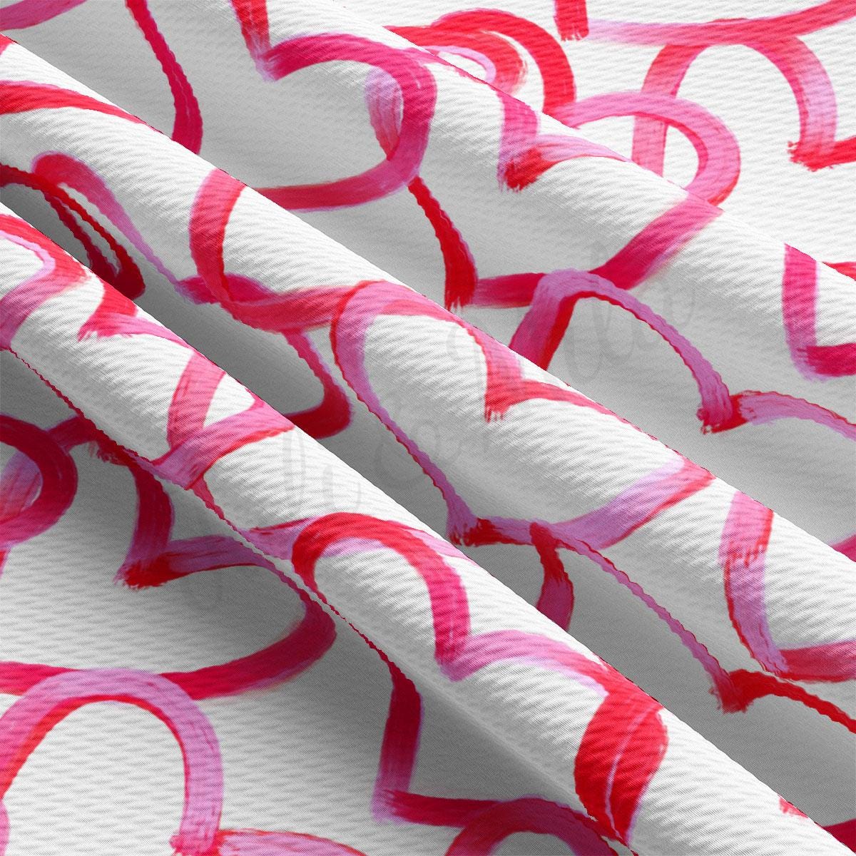 a close up of a pink and white wallpaper