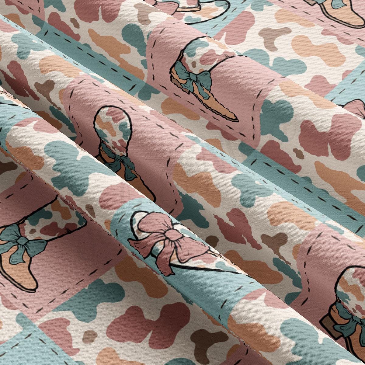 a close up of a pink and blue fabric