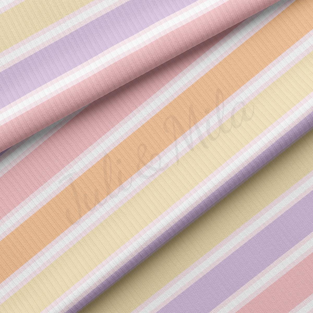 a pink, yellow, and purple striped wallpaper