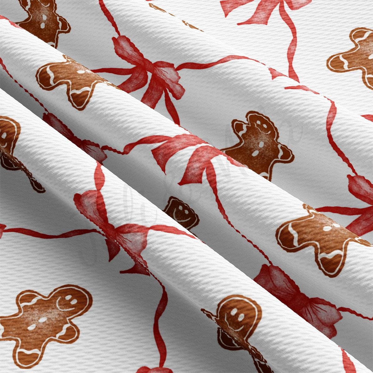 a close up of a wrapping paper with a pattern of gingerbreads