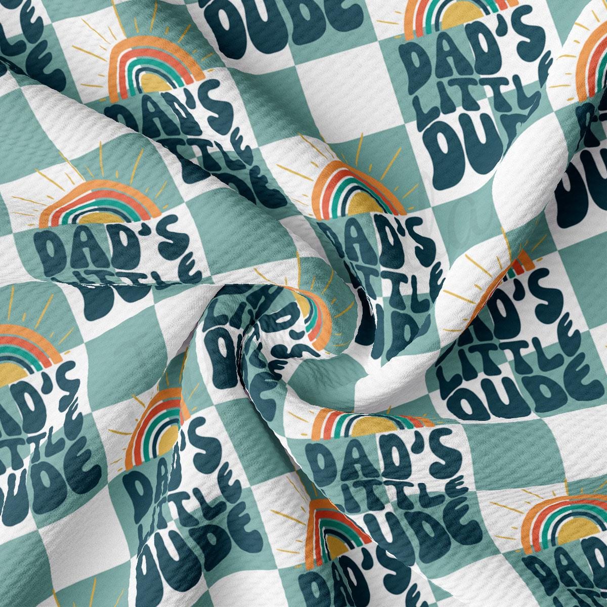 a blue and white checkered fabric with the words dad&#39;s little dude on