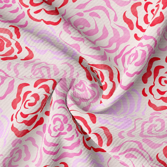 a pink and red flower print fabric