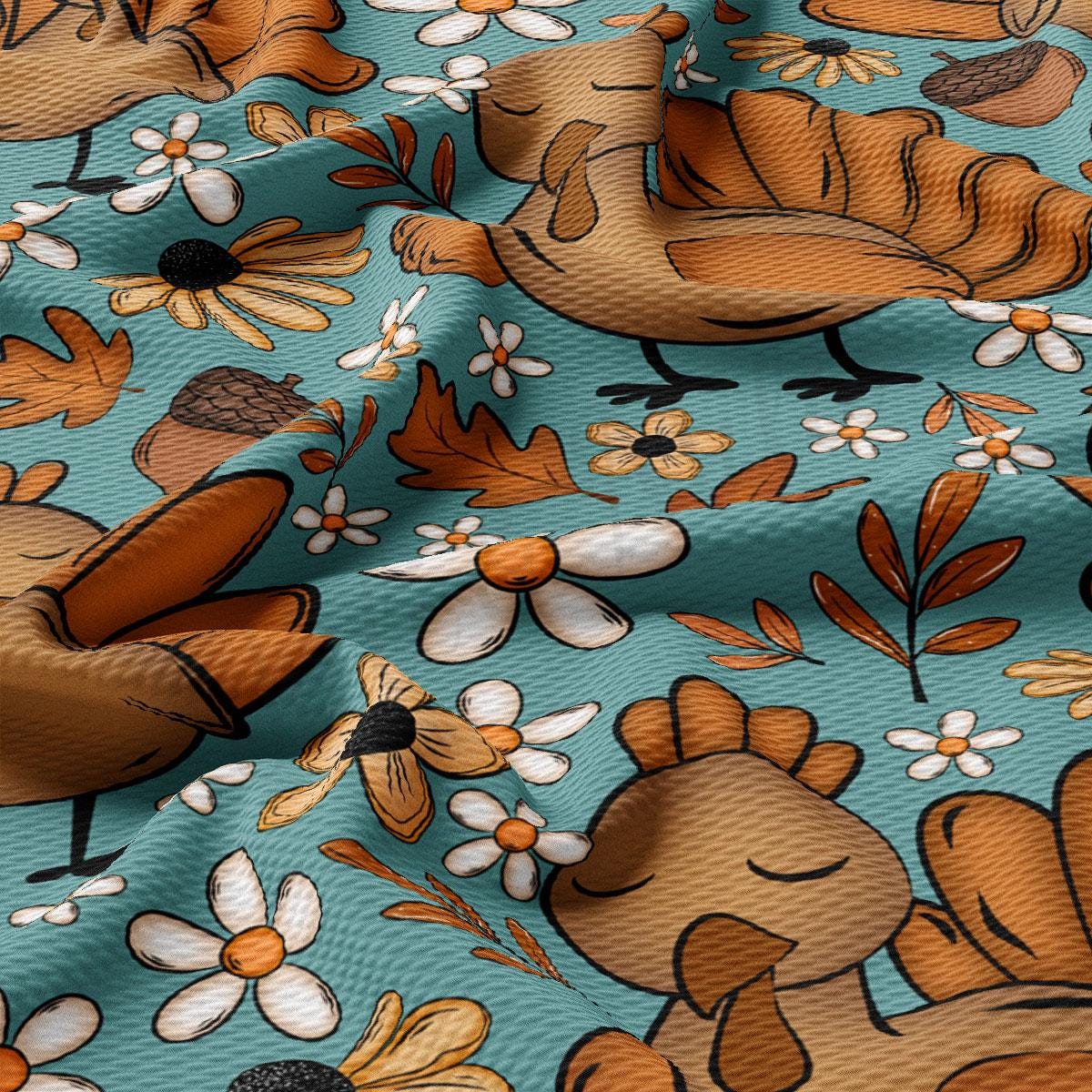 The image is a close-up of a fabric with a repeating pattern of turquoise background, brown and white flowers, and brown birds.