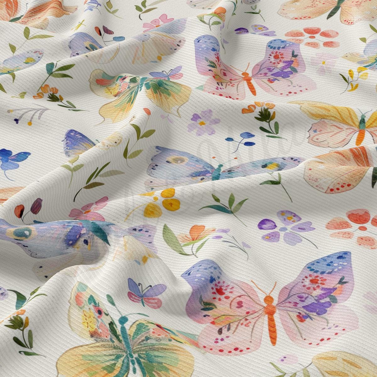 a white fabric with colorful butterflies on it