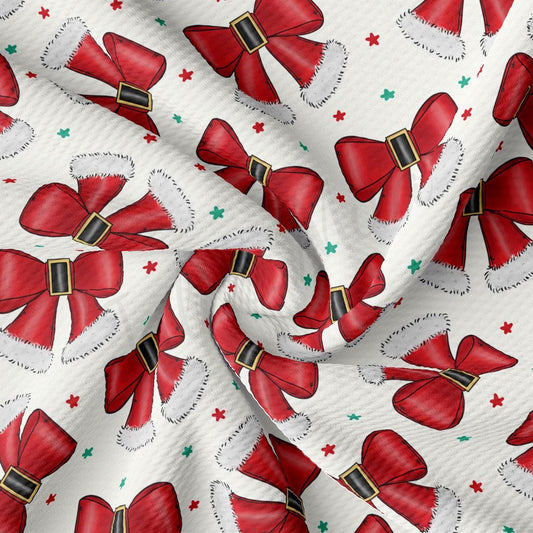 a repeating pattern of red bows with white fur trim and green stars on a white background.