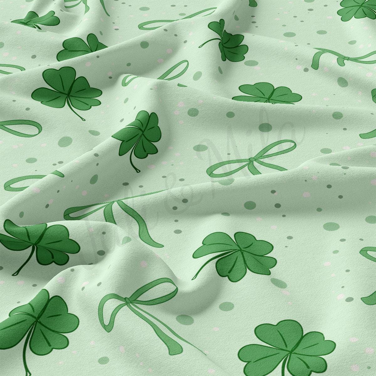 a close up of a sheet with shamrocks on it