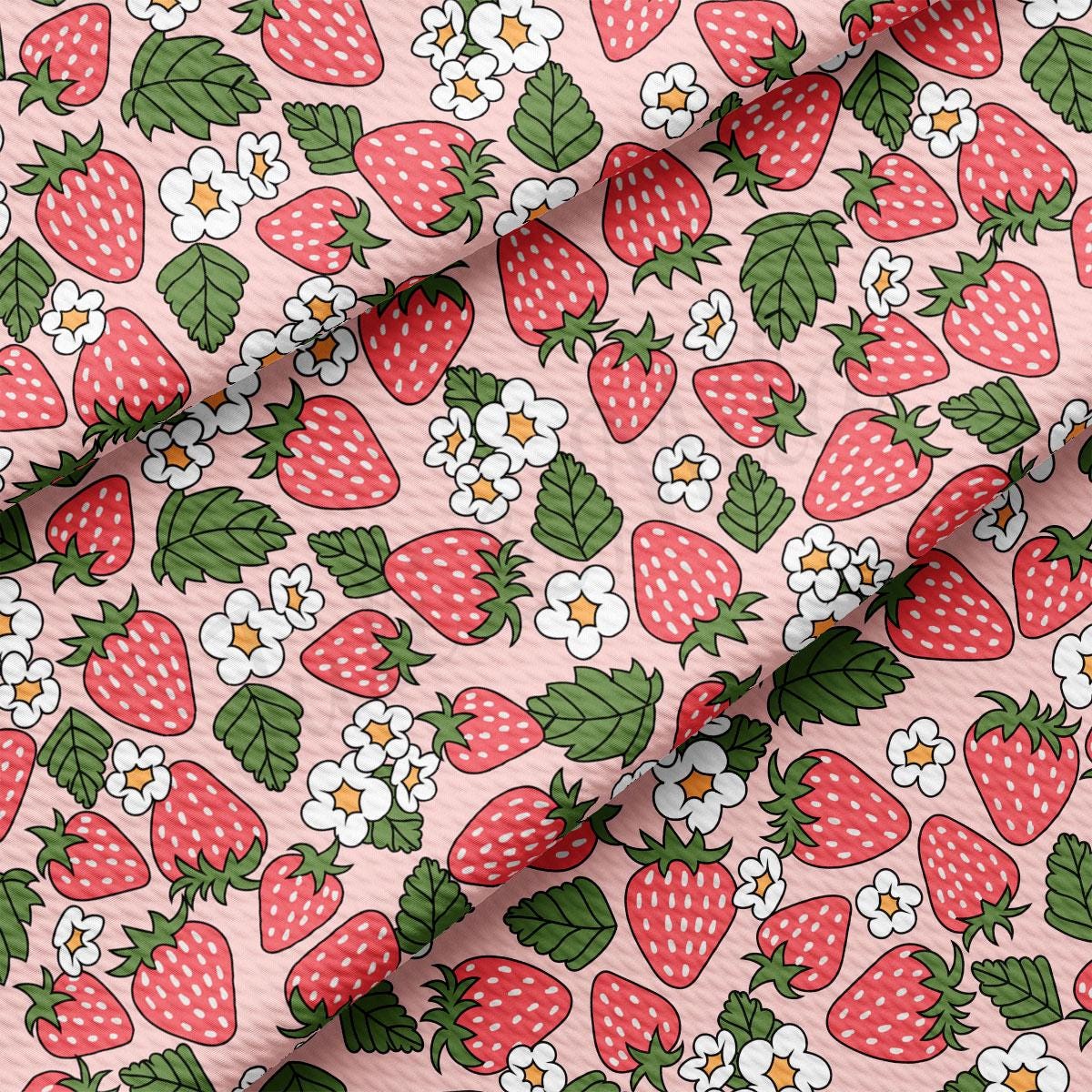 a pink background with strawberries and flowers