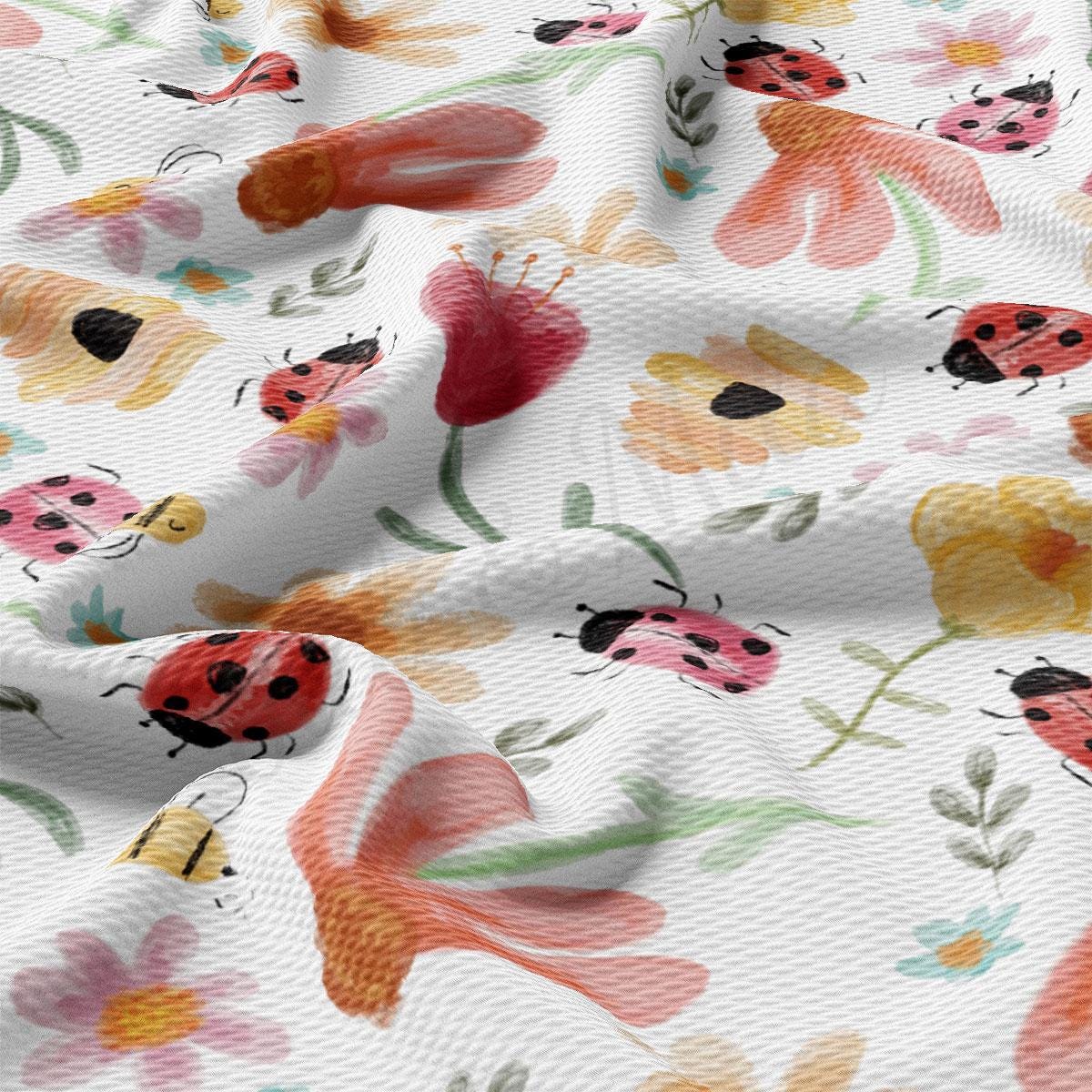 a white background with ladybugs and flowers