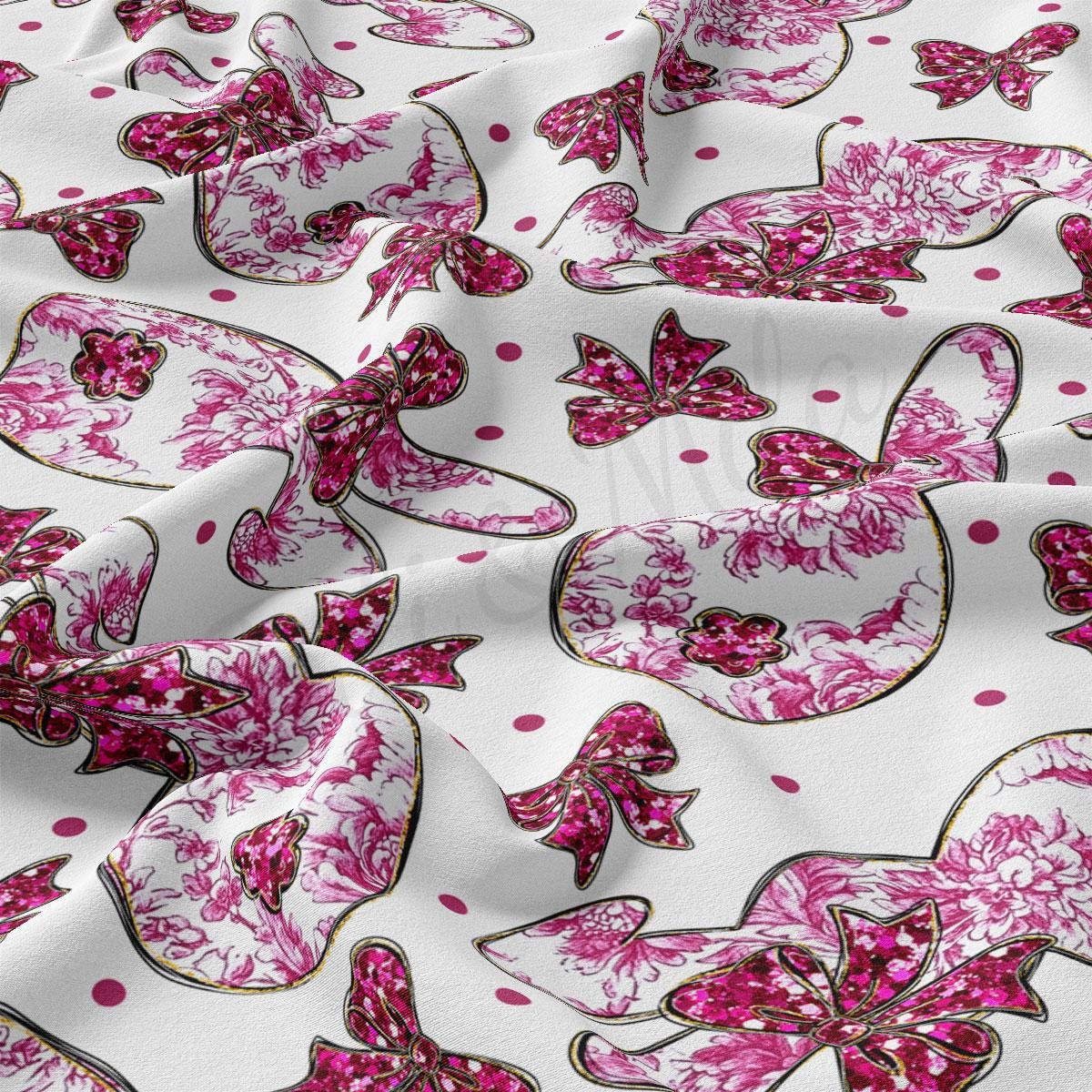 a close up of a pink and white fabric