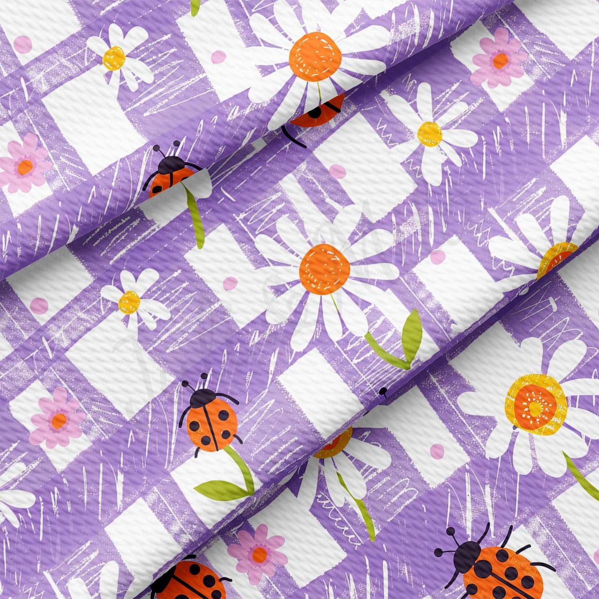 a purple background with ladybugs and daisies