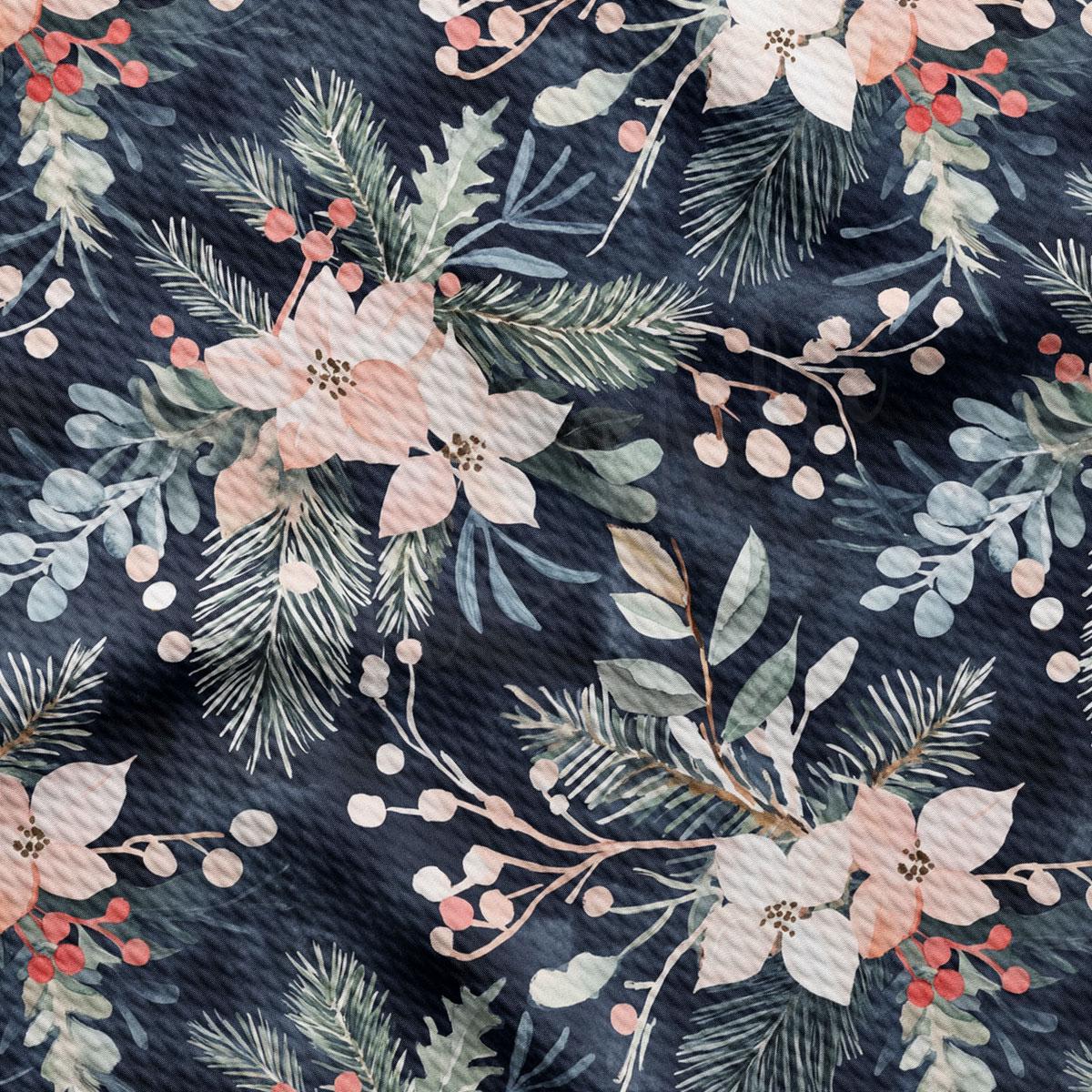 a close-up view of a dark blue fabric adorned with a floral pattern. The pattern consists of various flowers, leaves, and berries in shades of pink, white, and green, creating a visually appealing and intricate design.