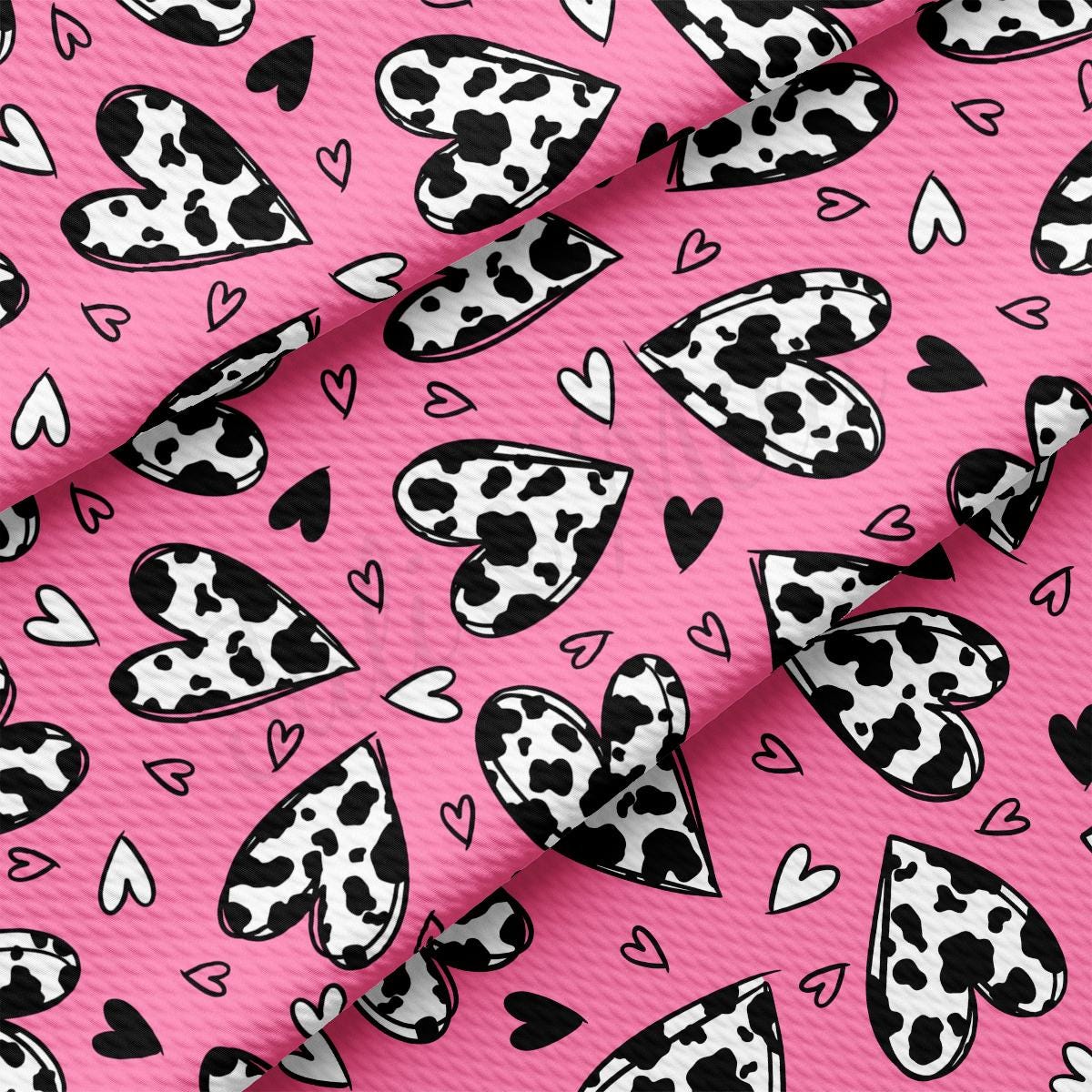 a pink background with black and white hearts