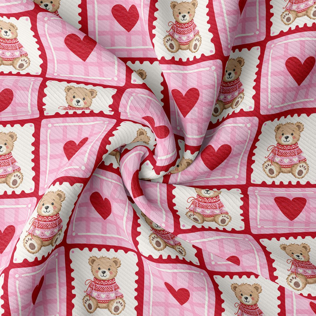 The image is a close-up of a fabric with a repeating pattern of pink and white checkered squares, each containing a teddy bear wearing a pink sweater and a red heart.
