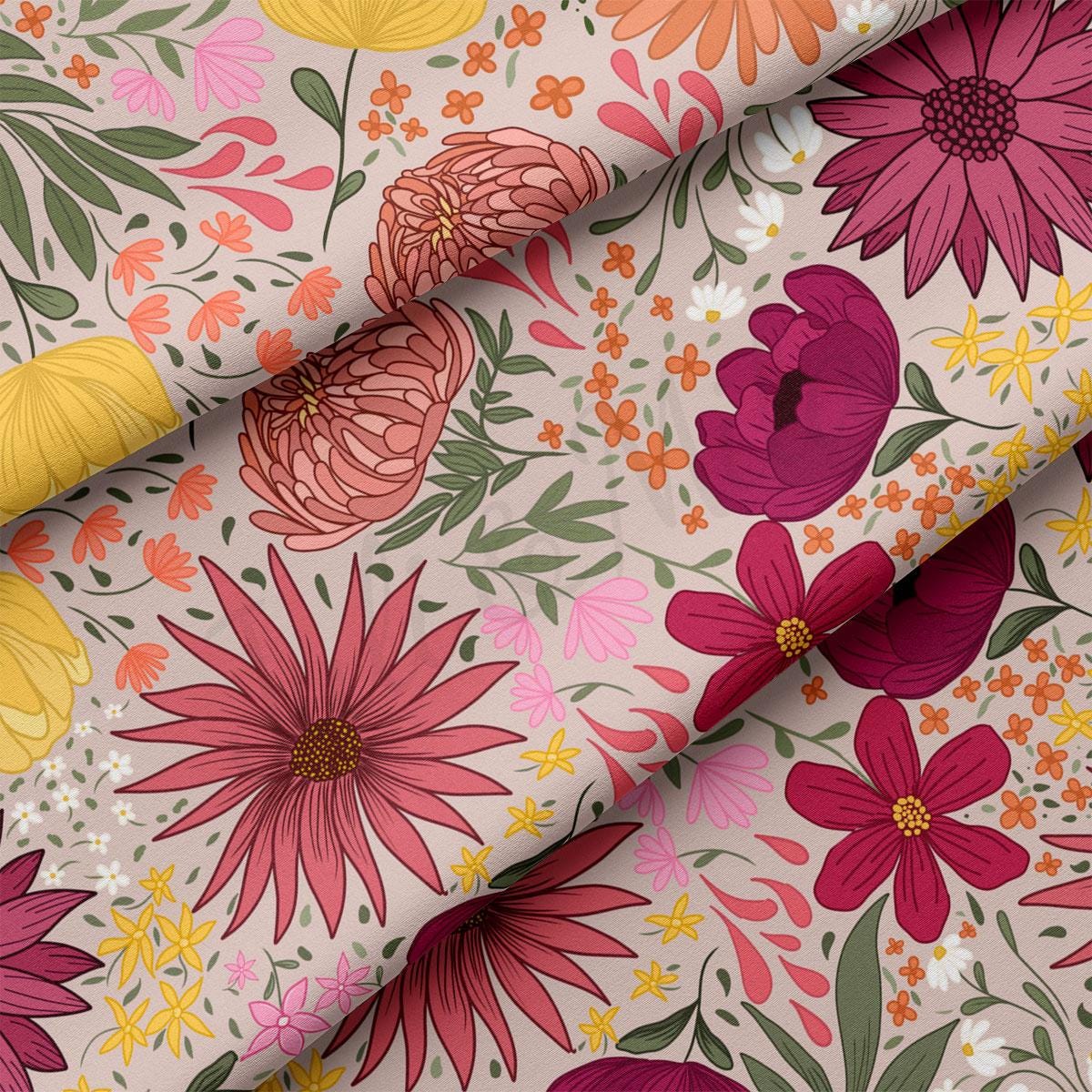a flowery fabric with many colors of flowers on it