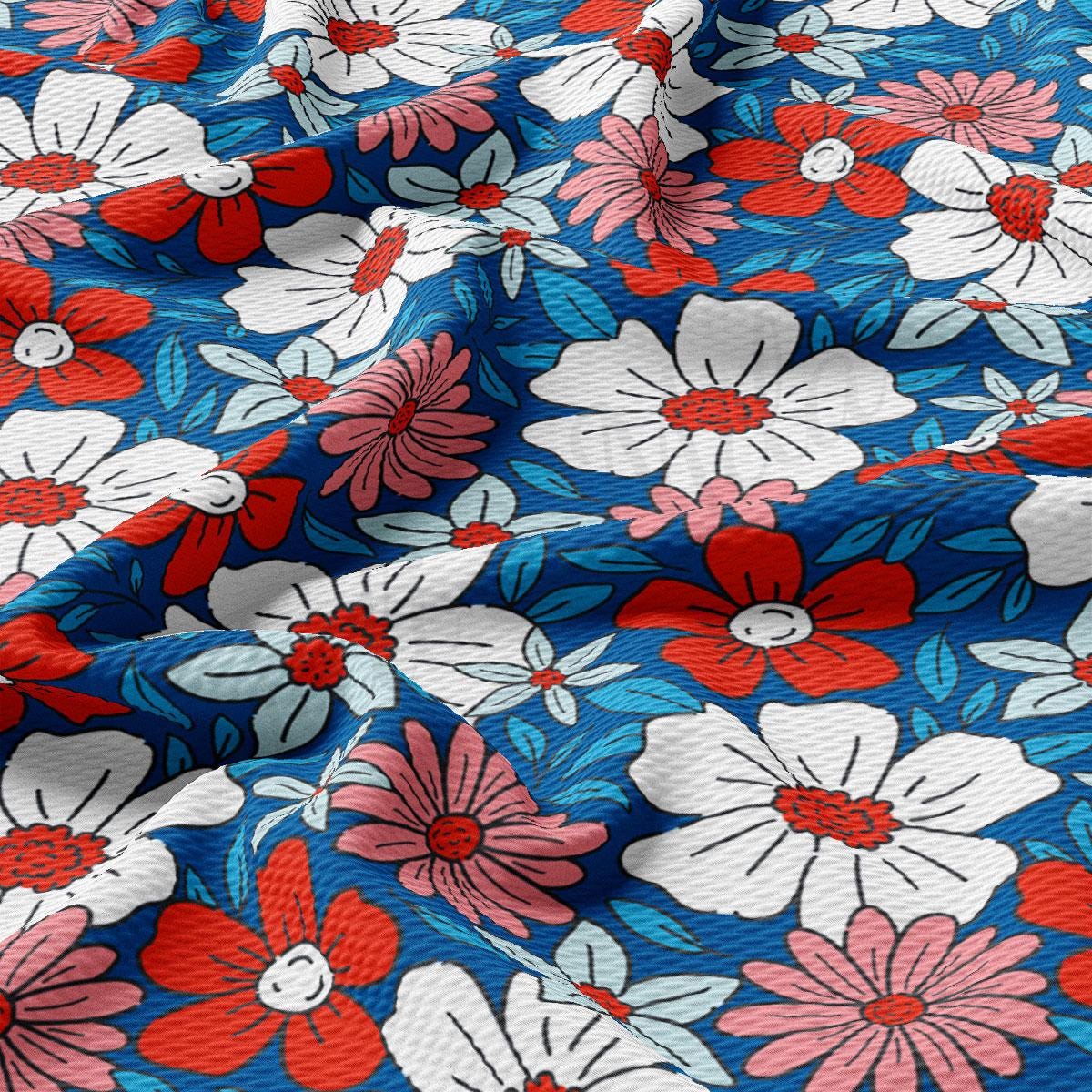 a red, white and blue floral print fabric