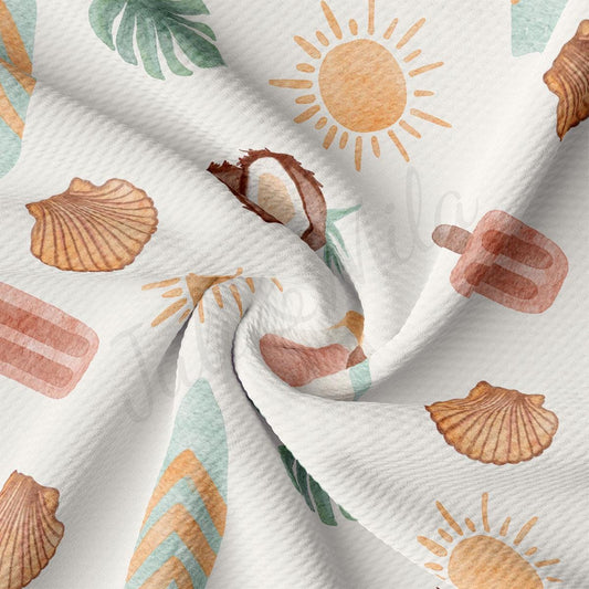 a close up of a white fabric with shells on it