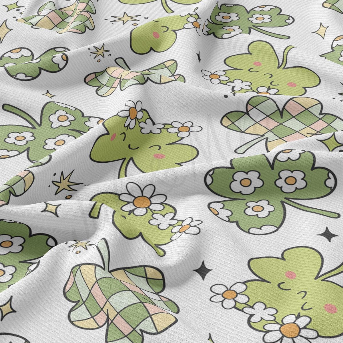 a close up of a pattern of shamrocks