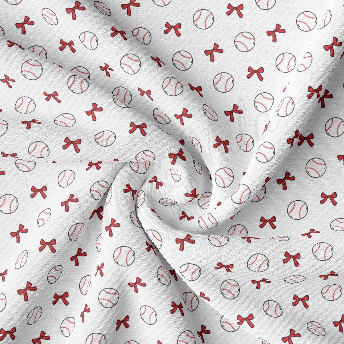 a close up of a baseball pattern on a white fabric