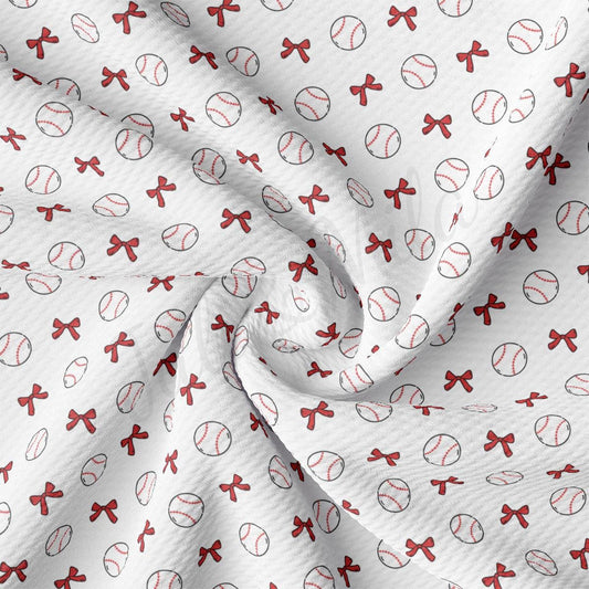 a close up of a baseball pattern on a white fabric