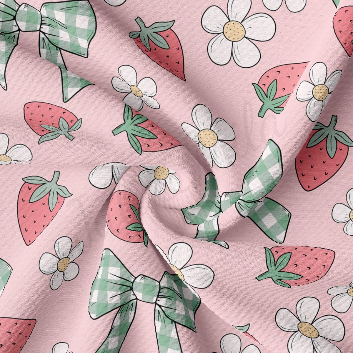 a pink background with a pattern of strawberries and flowers