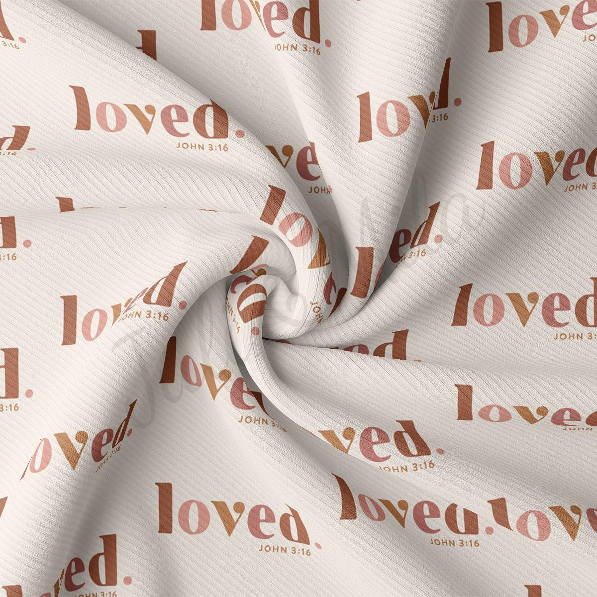 a repeating pattern of the word "loved" in a stylized font, with the text "loved" and "John 3:16" printed on a fabric surface.