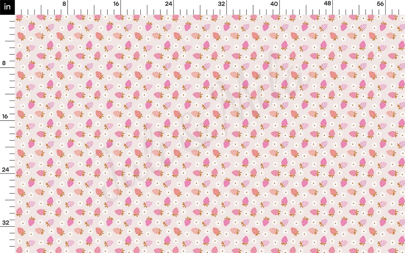 a ruler with a pink and orange pattern on it