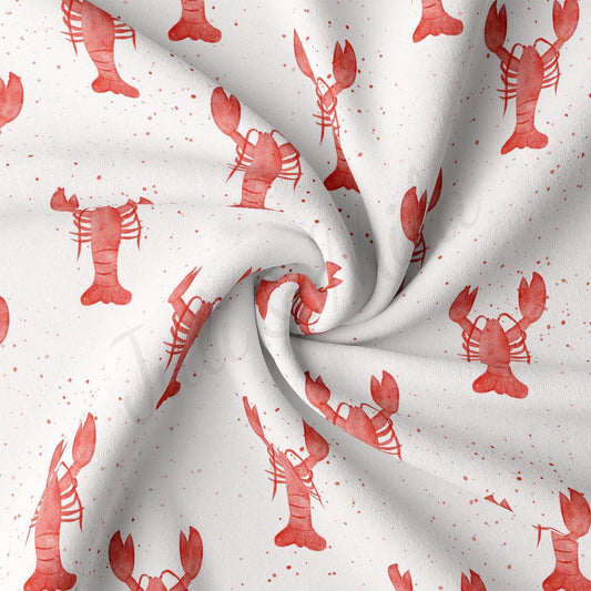 a red and white fabric with lobsters on it